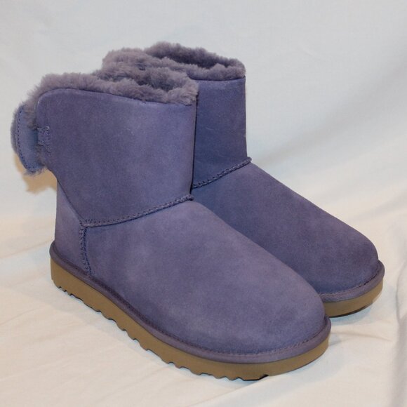 UGG WOMEN'S MINI BAILEY BOW SUEDE SHEARLING LINED ANKLE BOOTS PURPLE - Picture 1 of 9